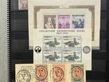 a picture of a picture of an old postcard and some stamps