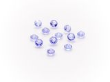 a group of blue sapphires on a white background