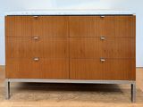 an image of a wooden dresser with a marble top