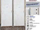 two doors that are open on the side of a building