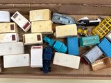 a cardboard box filled with different types of electronic devices