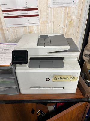 a printer that is sitting on top of a desk