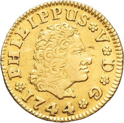 l'image d'une pièce d'or sur laquelle figure une tête de femme