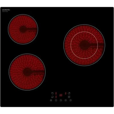 un gros plan sur une plaque de cuisson noire et rouge à trois feux