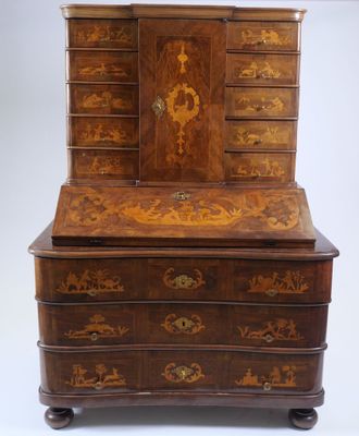 an old wooden bureau with drawers and drawers on wheels