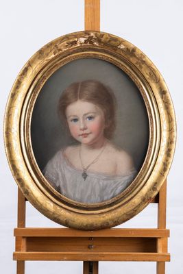 portrait of a young girl in a white dress by an easel