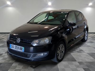 a picture of a black car parked in a garage