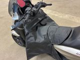 a motorcycle that is parked on the side of the street