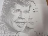 un dessin représentant un homme et une femme sur une feuille de papier