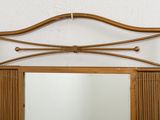 an image of a mirror hanging on a wall in a room