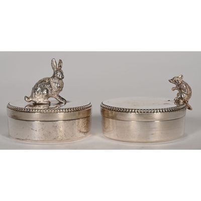 a pair of silver plated rabbit and rabbit figurines