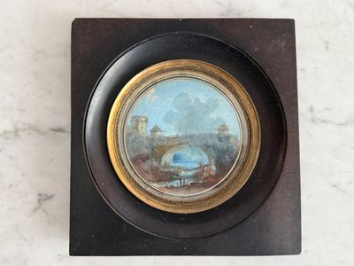 une image représentant une photo d'un tableau sur une surface en marbre