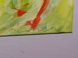 a painting on the wall of a room with a painting of two fish