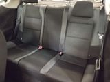 the back seats of a car are black in color