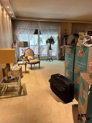 a room that has a lot of boxes on the floor