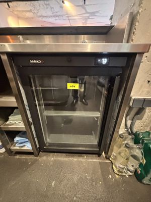 a glass door that is open in a kitchen