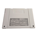 a nintendo game console sitting on top of a white table