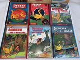 a lot of children ' s books that are on the table