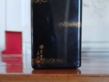 a black case sitting on top of a wooden table