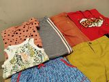 a box full of clothes sitting on top of a table