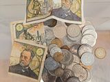 a glass container filled with coins and a picture of a man ' s face