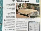 a magazine with a picture of a car on it