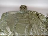 an image of a green rain coat on a white surface