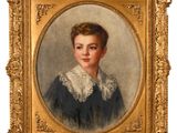 portrait of a young girl in a blue dress with a white collar