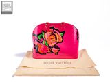louis vuitton pink rose handbag on a white background