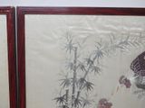 pair of framed asian paintings of a bird and bamboo tree