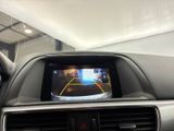 the interior of a car with a dash camera mounted on the dash
