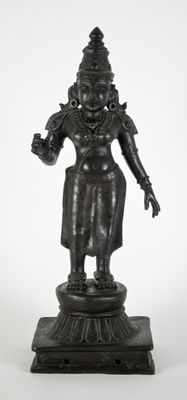 an image of a statue of a woman holding a flower