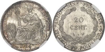a silver coin with the image of a woman sitting on a chair