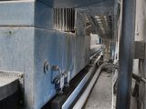 an image of a machine that is working on a piece of wood