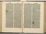 an open book with two pages of text on top of it