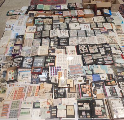 a lot of pictures on the floor of this room