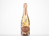 a bottle of champagne sitting on top of a table