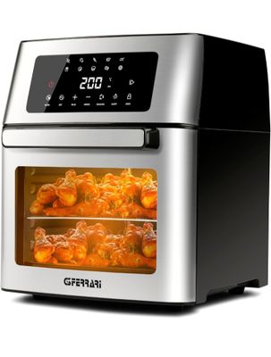 un gros plan sur une friteuse à air chaud contenant du poulet