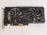 a close up of a video card with a fan on it