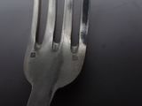 a fork that is sitting on top of a table