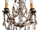 an image of a chandelier with three lights hanging from it ' s sides