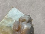 a picture of a piece of rock with a piece of soap on it