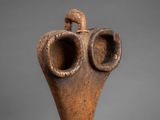 an image of a sculpture of a bird on a stand