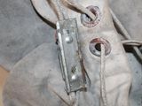 a close up of a pair of shoes with a metal buckle
