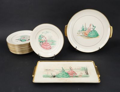 three plates and a tray with a picture of a woman in a garden