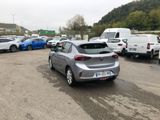 many cars parked in a parking lot in a lot