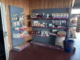 a room with shelves of various items in it