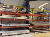 many shelves with different types of materials in a warehouse