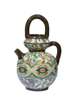 une image représentant un vase muni d'une anse