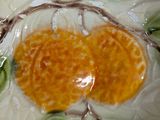 a white bowl with a yellow flower on it